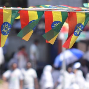Ethiopian flags flying at event.